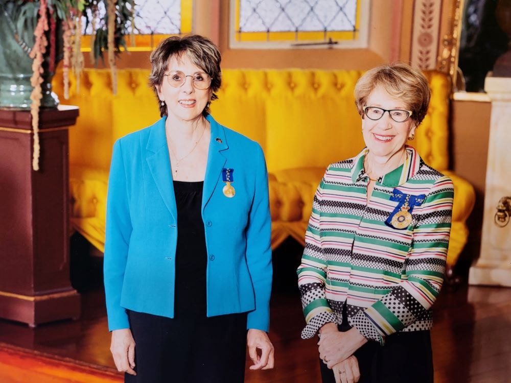 Coralie wearing her Order of Australia medal at the investiture ceremony